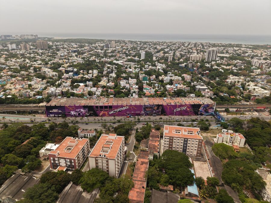 The full length of the Campa Energy mural seen from above the Chennai skyline
